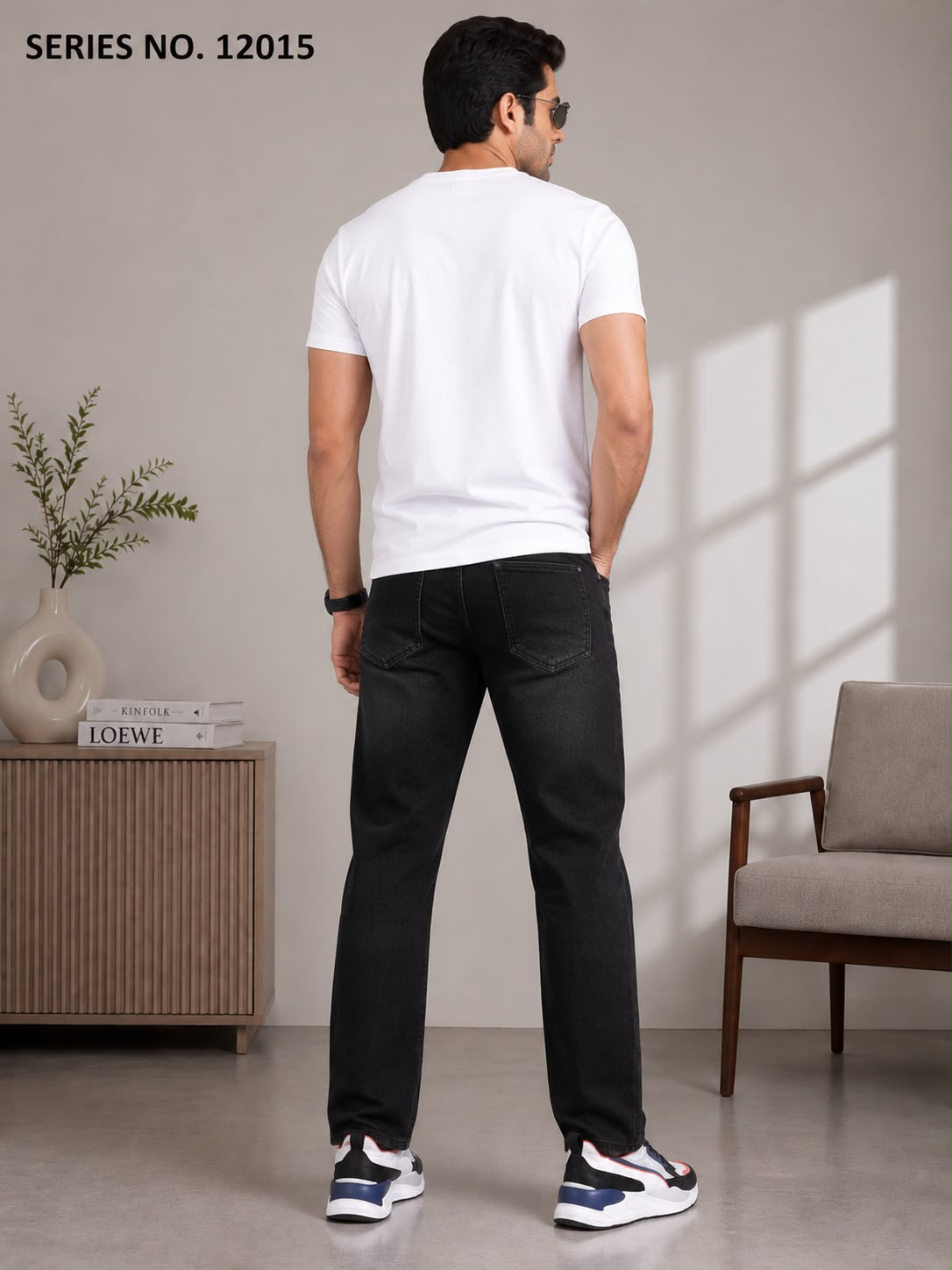Men's mid black relaxed fit jeans with mid-rise waist for smart casual style and refined comfort. Premium denim with wide-leg silhouette ensures versatile formal pairing and easy movement. Durable clean wash offers lasting wear.