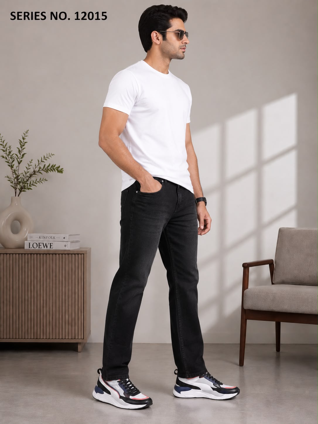 Men's mid black relaxed fit jeans with mid-rise waist for smart casual style and refined comfort. Premium denim with wide-leg silhouette ensures versatile formal pairing and easy movement. Durable clean wash offers lasting wear.