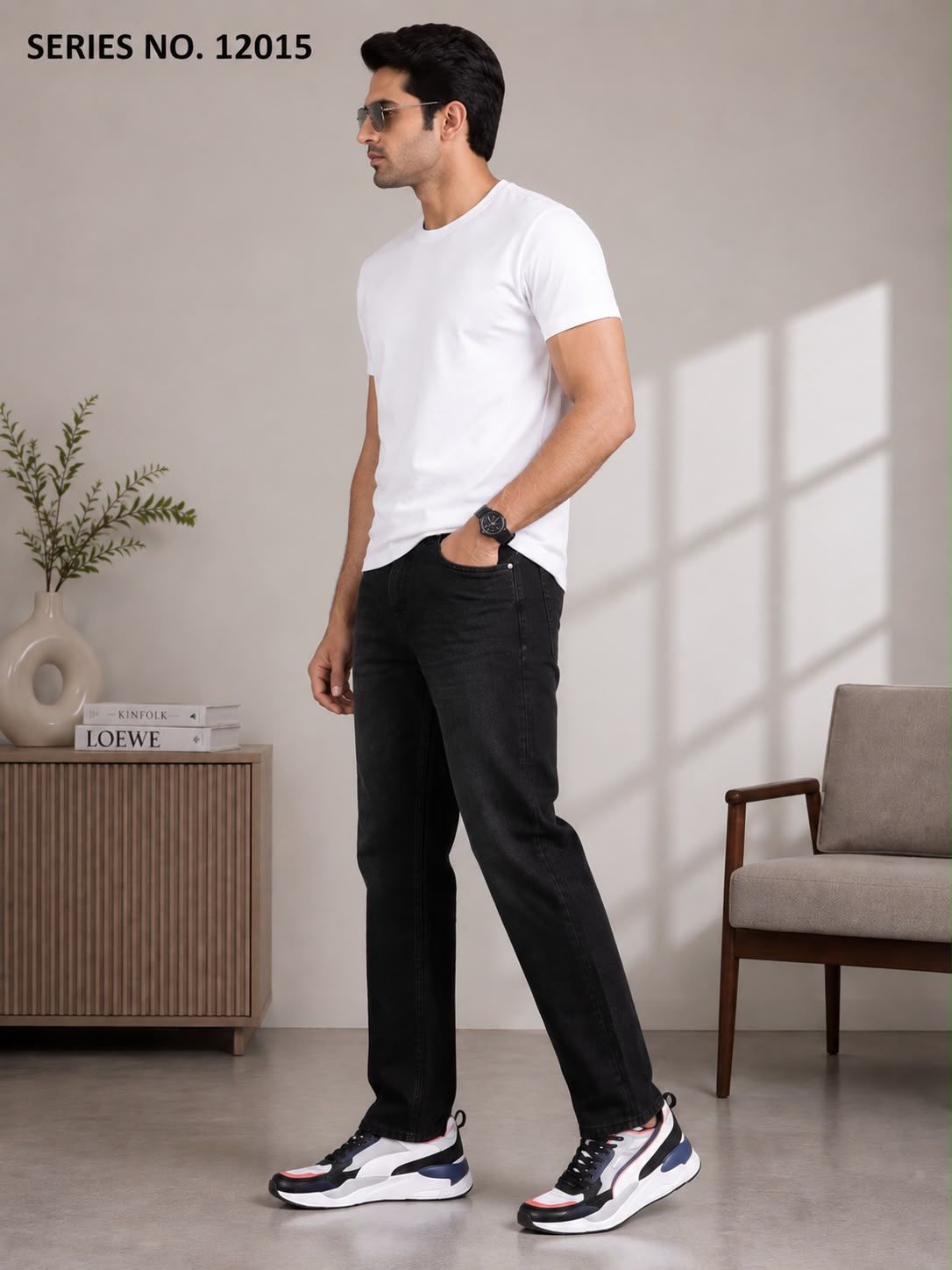 Men's mid black relaxed fit jeans with mid-rise waist for smart casual style and refined comfort. Premium denim with wide-leg silhouette ensures versatile formal pairing and easy movement. Durable clean wash offers lasting wear.