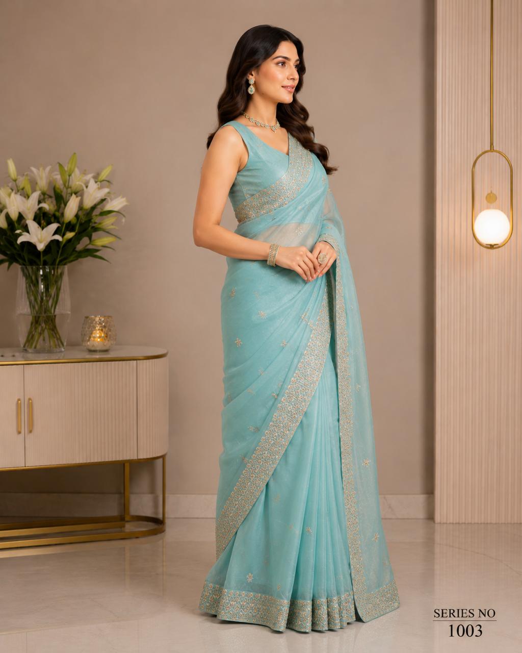 Women's Aqua Blue Organza Saree with Gold Zari Embroidery & Heavy Border