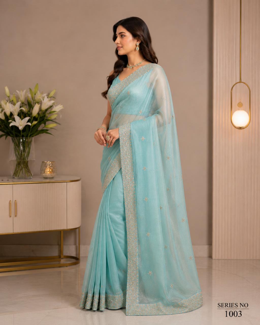 Women's Aqua Blue Organza Saree with Gold Zari Embroidery & Heavy Border